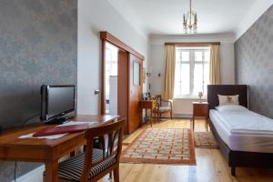 Postel nebo postele na pokoji v ubytování Boardinghouse Sonne
