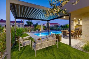 Πισίνα στο ή κοντά στο Pieron & Bavigo Villas - Spa Oasis