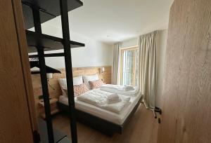 Posteľ alebo postele v izbe v ubytovaní Chalet H Montafon + 37 fotografií