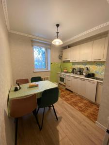 Kuchyň nebo kuchyňský kout v ubytování Central Apartment in Golden Square