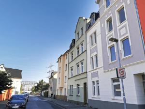 a row of buildings on the side of a street at Worker's Apartment in Leverkusen L1-4 in Leverkusen