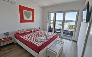 Posteľ alebo postele v izbe v ubytovaní Villa Pura Vida with Sea View