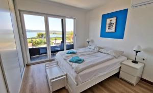 Posteľ alebo postele v izbe v ubytovaní Villa Pura Vida with Sea View