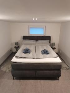 Postel nebo postele na pokoji v ubytování Bungalow Lange + 4 fotografie