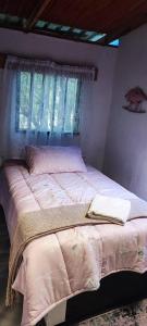 Ένα ή περισσότερα κρεβάτια σε δωμάτιο στο Babushka backpackers