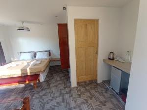 Postel nebo postele na pokoji v ubytování Jalyn's Resort Sabang