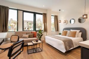 Postel nebo postele na pokoji v ubytování Catalina en Madrid