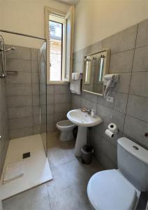 Koupelna v ubytování Hotel Ely