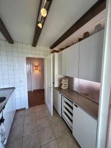 Cucina o angolo cottura di Cache-Cache MOUNTAIN & QUIET chalet 10 pers