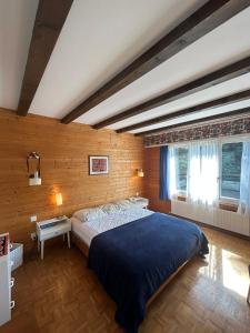 Letto o letti in una camera di Cache-Cache MOUNTAIN & QUIET chalet 10 pers