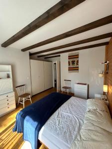 Letto o letti in una camera di Cache-Cache MOUNTAIN & QUIET chalet 10 pers