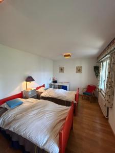 Letto o letti in una camera di Cache-Cache MOUNTAIN & QUIET chalet 10 pers
