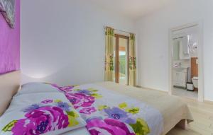 Łóżko lub łóżka w pokoju w obiekcie Villa Santa Lucia - Istrian Oasis
