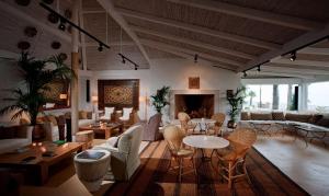 Uma área de estar em Hotel Don Pepe Gran Meliá