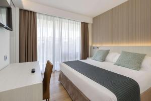 Кровать или кровати в номере Sol Torremolinos - Don Pedro