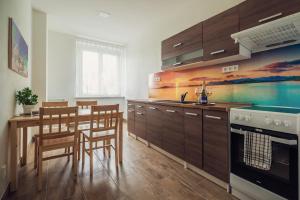 Kuchyňa alebo kuchynka v ubytovaní Skodova 4 Apartments