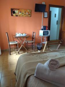 Katil atau katil-katil dalam bilik di B&B La Pace Ardea