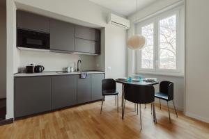 Kuchyň nebo kuchyňský kout v ubytování Pinturicchio's Rooms at Flaminio