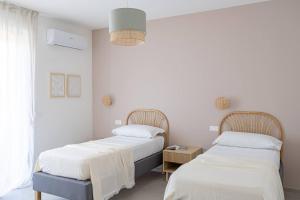 Postel nebo postele na pokoji v ubytování Villa Novelli - YourPlace Abruzzo