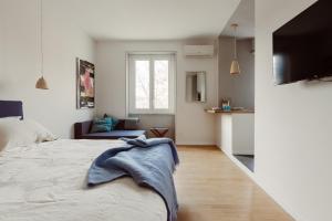 Postel nebo postele na pokoji v ubytování Pinturicchio's Rooms at Flaminio