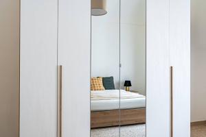 Ένα ή περισσότερα κρεβάτια σε δωμάτιο στο La casa di FeliGiò - YourPlace Abruzzo