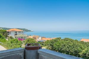 a view of the ocean from the balcony of a house at Ferrante - YourPlace Abruzzo in Fossacesia