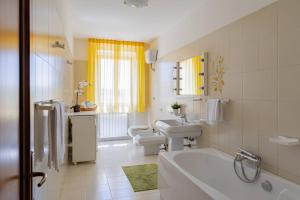 Ένα μπάνιο στο La Rocchetta