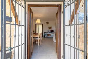Ένα ή περισσότερα κρεβάτια σε δωμάτιο στο Il fico nel Pozzo - YourPlace Abruzzo