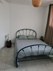 Postel nebo postele na pokoji v ubytování Appartement T2 spacieux à FREHEL