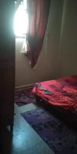 Ένα ή περισσότερα κρεβάτια σε δωμάτιο στο Agadir apartment