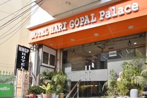 a restaurant with a sign that reads foodant gold palace at Hotel Hari Gopal in Varanasi
