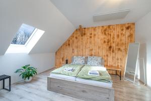 Postel nebo postele na pokoji v ubytování Hajnýho stodola - ubytování