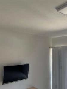 TV a/nebo společenská místnost v ubytování Eco Paradise Apto 214