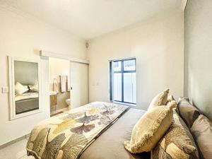 Ένα ή περισσότερα κρεβάτια σε δωμάτιο στο Home away from home +2 φωτογραφίες