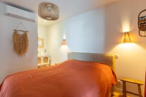 Cama ou camas em um quarto em Demeure d'exception vue mer