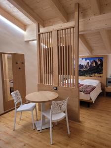 Postel nebo postele na pokoji v ubytování Garni B&B Mozart Nesthouse