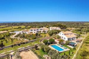 an aerial view of a villa with a swimming pool at Finca Llucasaldent Menor by Menorca Vacations in Alaior