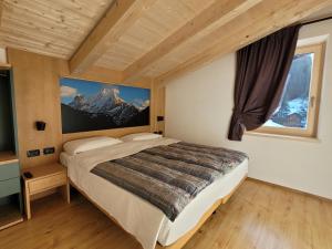 Postel nebo postele na pokoji v ubytování Garni B&B Mozart Nesthouse