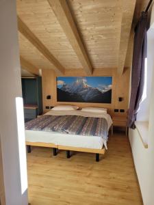 Postel nebo postele na pokoji v ubytování Garni B&B Mozart Nesthouse