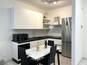 Fotografie z fotogalerie ubytování SG Family - Central Garda Apartment v destinaci Garda + 20 fotografií