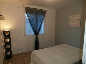 Postel nebo postele na pokoji v ubytování gîte le Mistralou + 24 fotografií