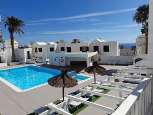 Bazén v ubytovaní Apartment VOLVORETA - Pool view- Good Wifi - Smart TV - Residence Atlantic View alebo v jeho blízkosti
