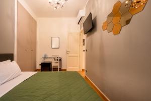 Televízia a/alebo spoločenská miestnosť v ubytovaní Casa Vivaldi Guest House