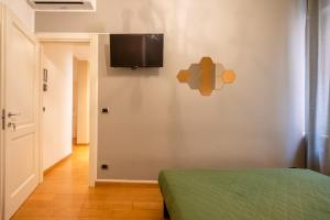 Televízia a/alebo spoločenská miestnosť v ubytovaní Casa Vivaldi Guest House