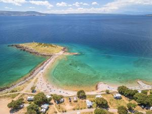 an aerial view of a small island in the water at Camping Klenovica in Klenovica