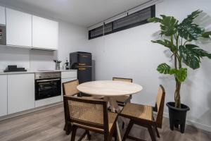 Una cocina o zona de cocina en VLC Host - Tamarit