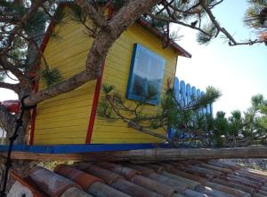 a house on top of a tree at Rustic Villa Rudine in Dobrinj +17 photos