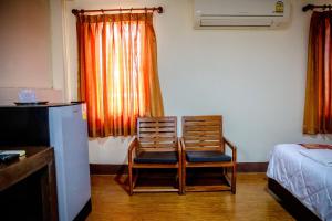 Lukmuang 2 Hotel客房内的一张或多张床位