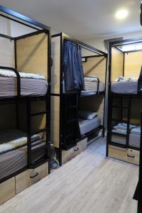 Postel nebo postele na pokoji v ubytování Onefam Notting Hill