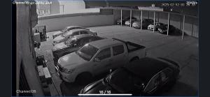 a group of cars parked in a parking lot at فندق دلسDELS HoTEL in Tabuk